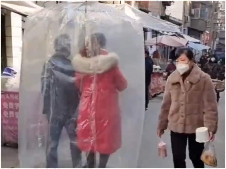 Viral Video Of Chinese Couple Covering Themselves In A Plastic Wrap Against Covid-19