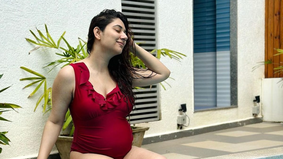 Mom-To-Be Disha Parmar Looks Gorgeous As She Flaunts Her Baby Bump In Red Swimwear; Photo