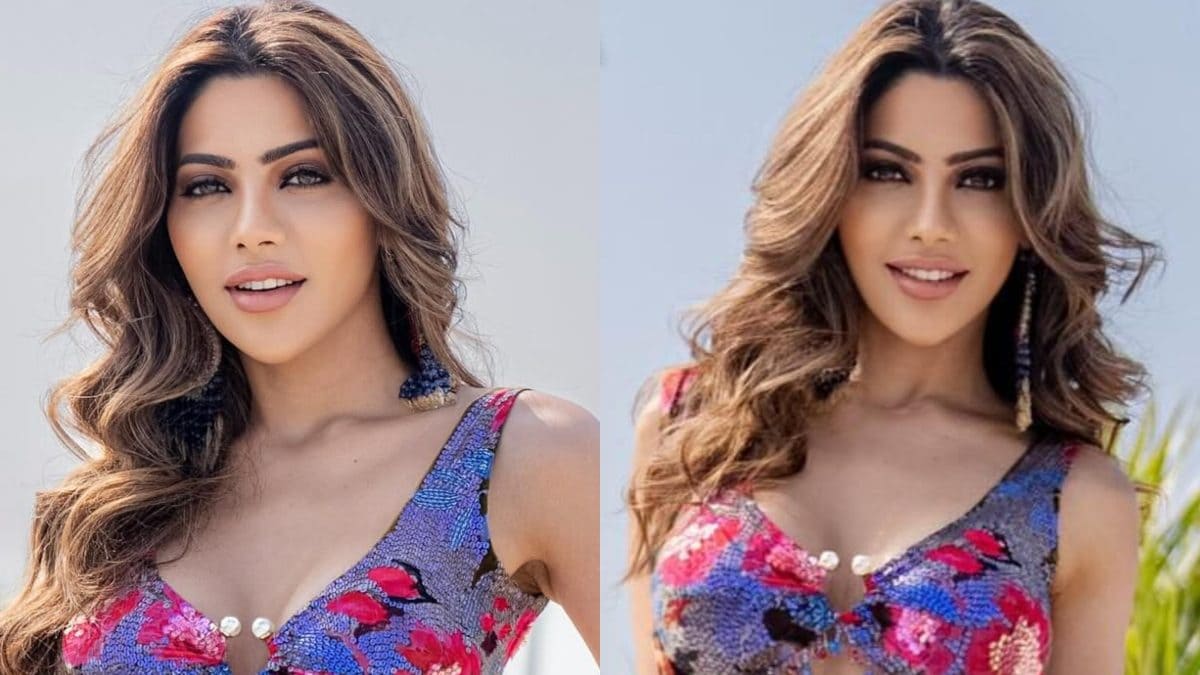 Sexy! Nikki Tamboli Flaunts Ample Cleavage In Red Floral Blouse; Check Out Viral Photos